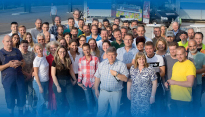 Kroop Fahrerteam Gruppenbild mit Warnwesten