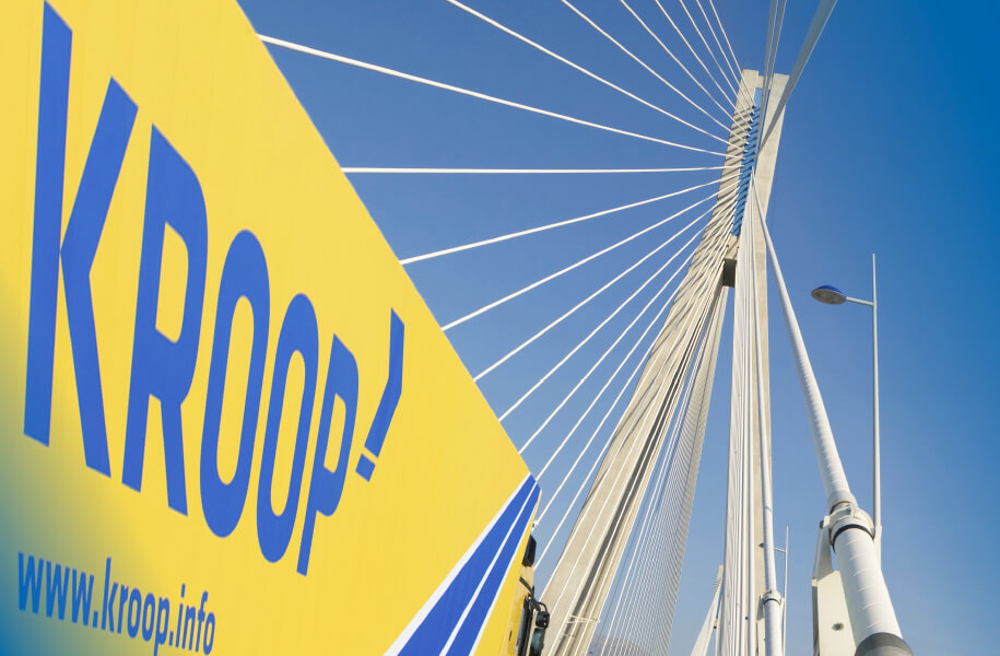 Kroop truck drives across bridge